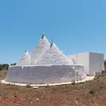 Trullo White Dream Con Piscina アパート カロヴィーニョ